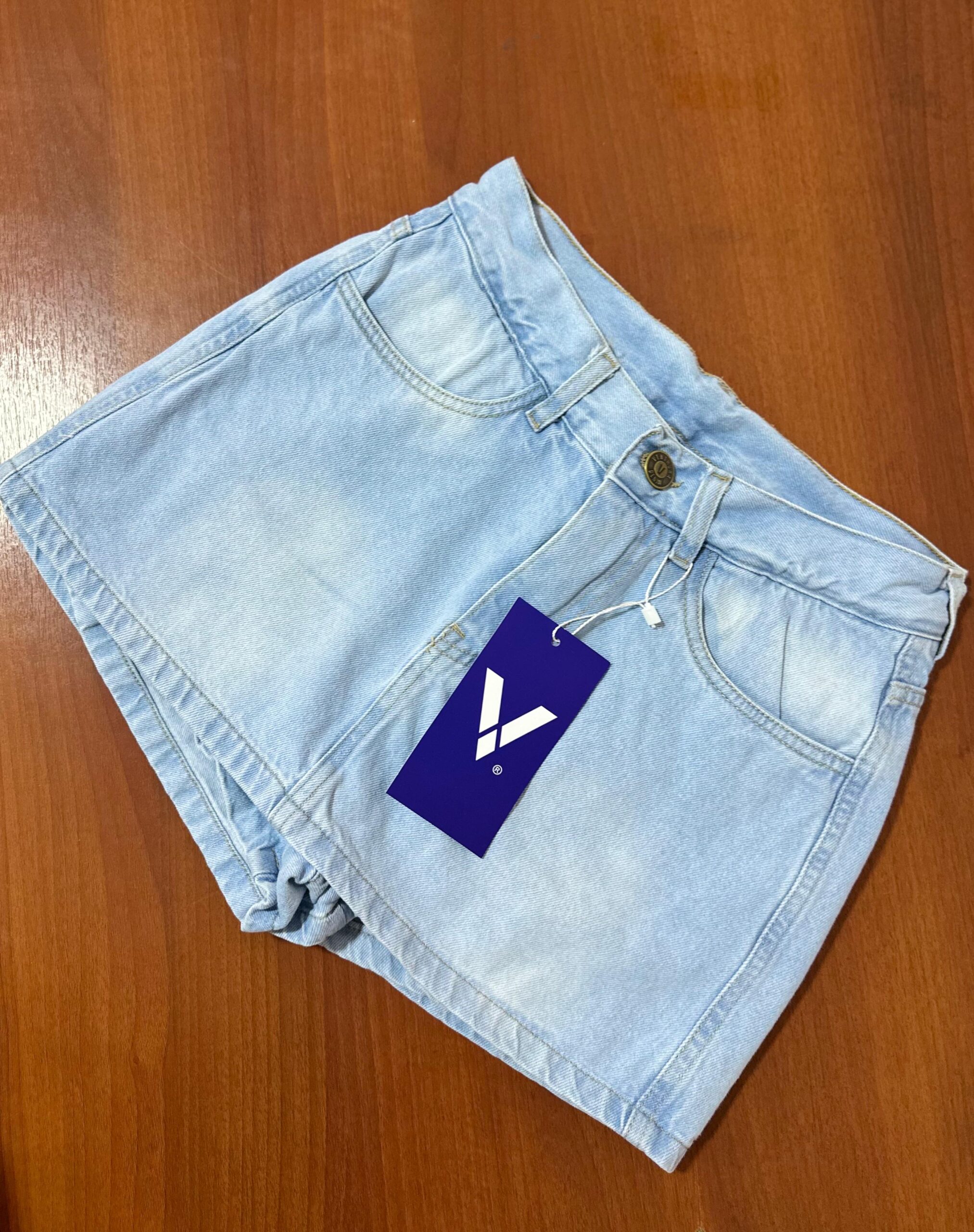 POLLERA SHORT CELESTE LOCALIZADO  DENIM